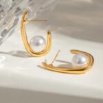 halo luxe earrings on table