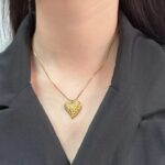 golden pendant with chain