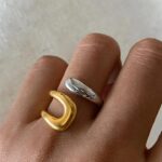 golden coast ring on finger