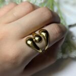 liquid gold statement ring wear by an woman