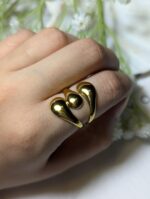 liquid gold statement ring wear by an woman