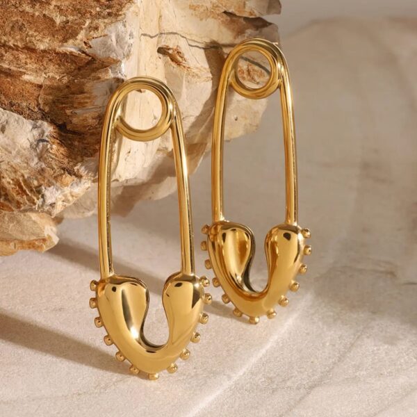 golden pin heart earrings